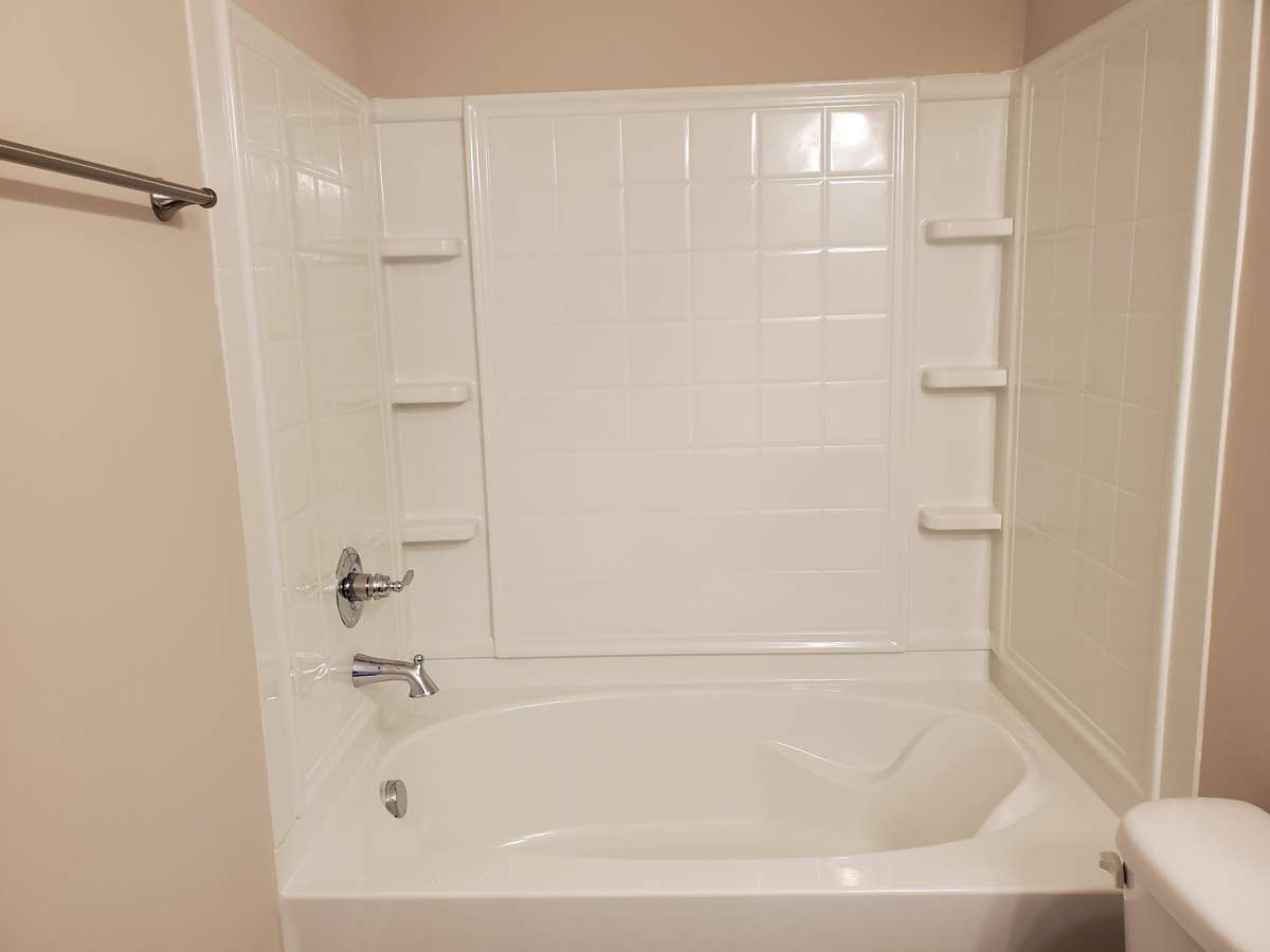 Tub/Shower Combo in Owner's Bath. Previous House is pictured.