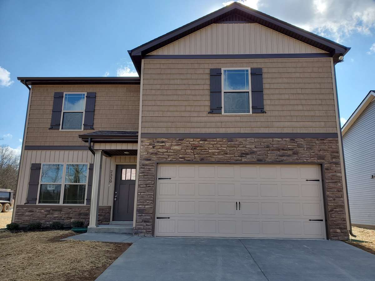 Lot 116 Valley Farms will have Stacked Stone with Brown Tones.   This is a Picture of a Previous Similar House.
