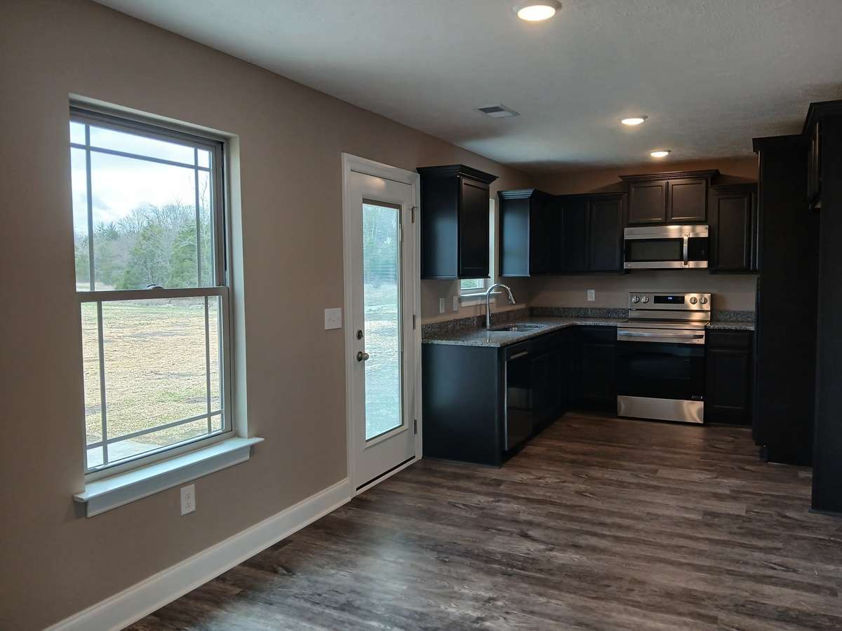 Kitchen Features Stainless Upgraded Stove with Convection Oven. 
Picture of Previous House.