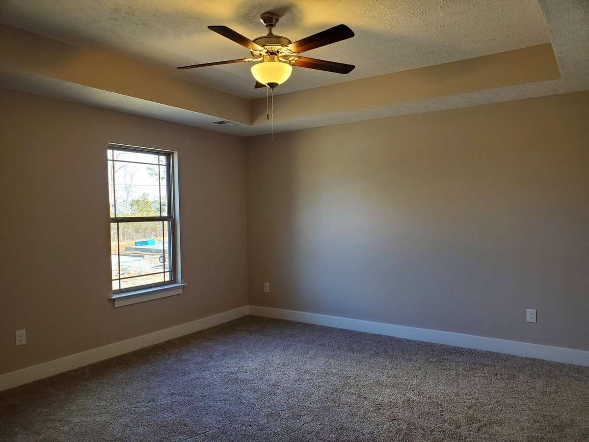 Owners Suite with Trey Ceiling.  Previous House is shown.