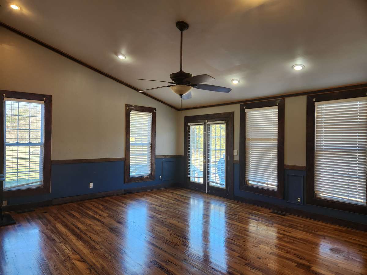 Living Room has an abundance of Windows for Natural Light.