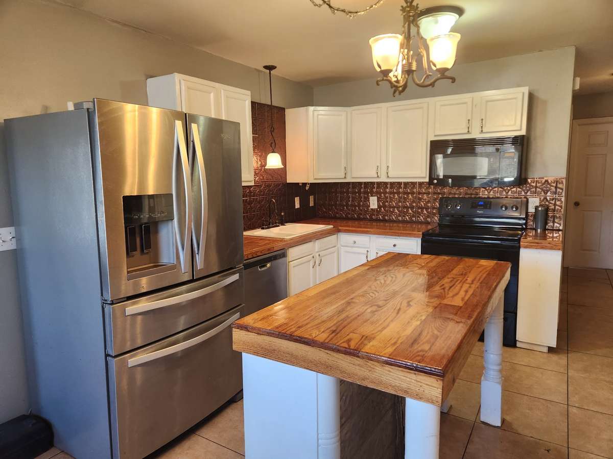 Kitchen Appliances include Refrigerator, Stove, Microwave and Dishwasher.