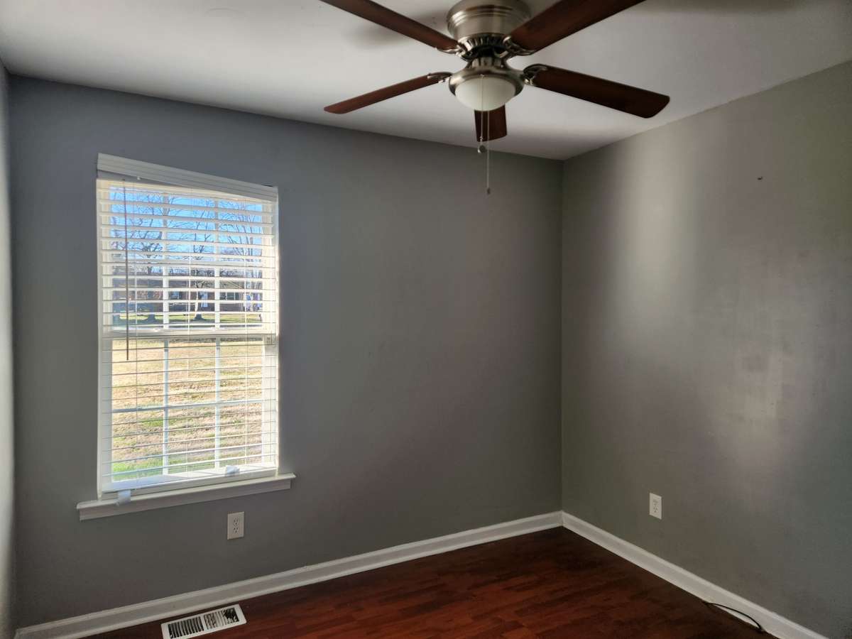 2nd Bedroom has Hardwood Floors and Ceiling Fan.