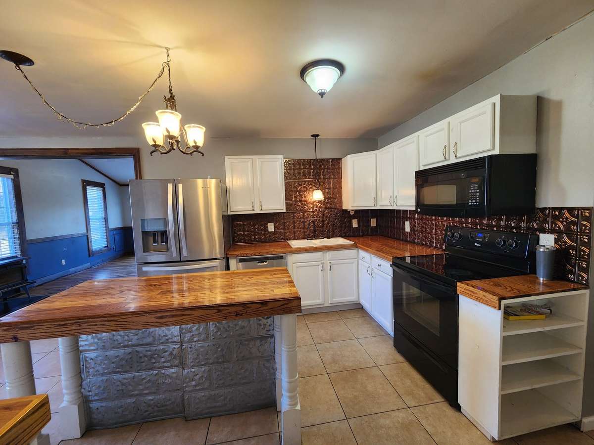 Kitchen has Extra Cabinets and Counter Space.