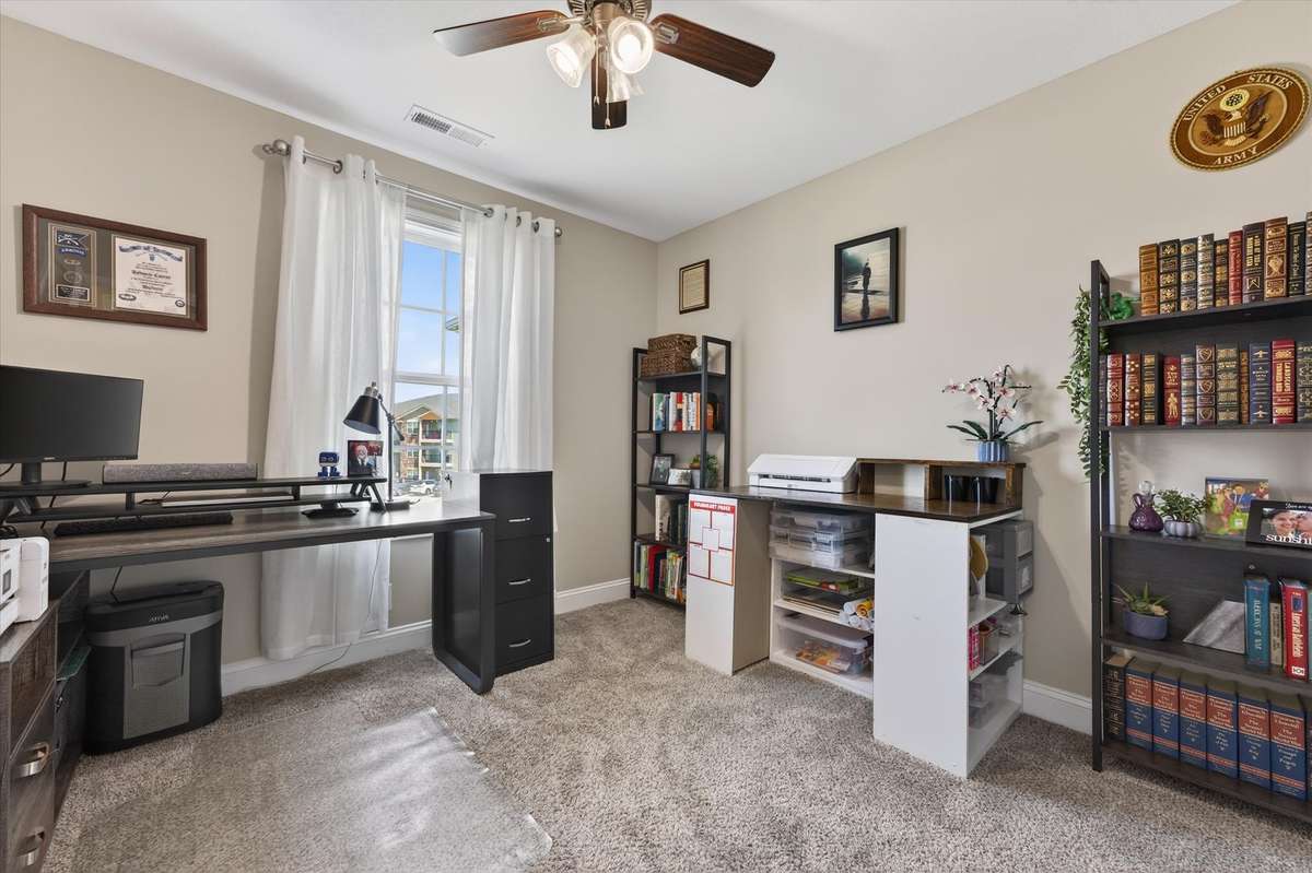 The third bedroom also has a ceiling fan