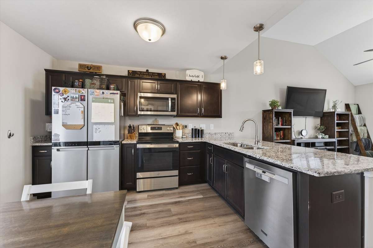 Stainless steel appliances finishes this sleek modern kitchen