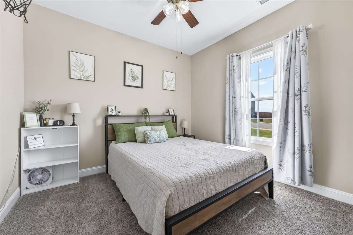 There is a fourth bedroom on the basement level