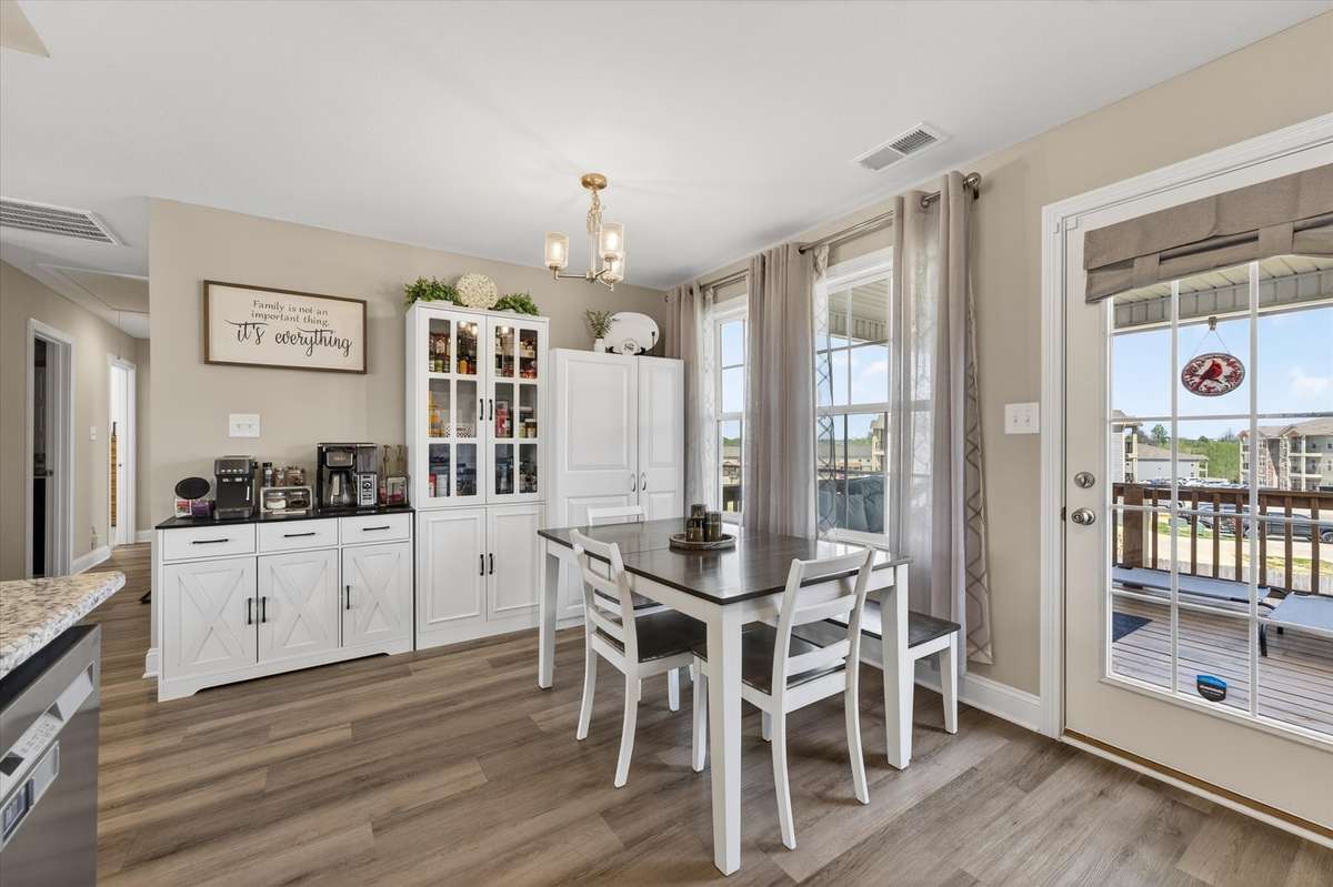 This eat-in kitchen has a wonderful view of the back yard