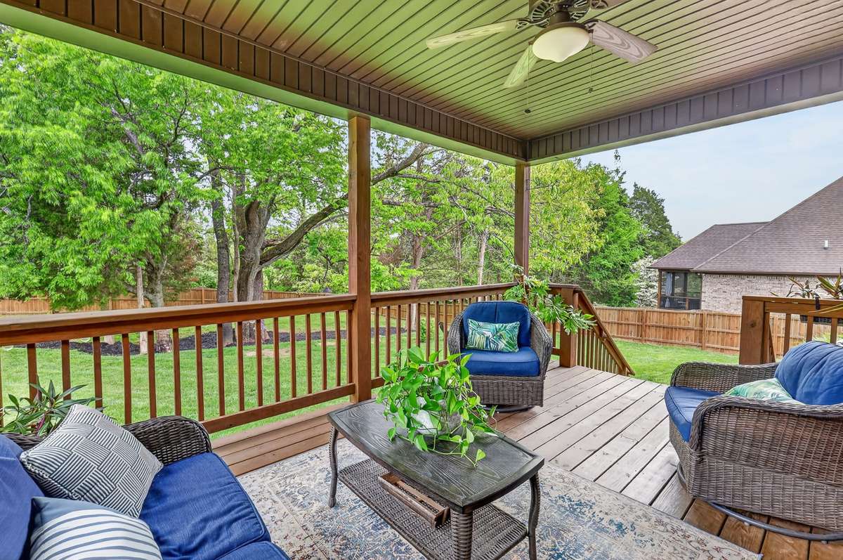 Covered deck with park-like back yard