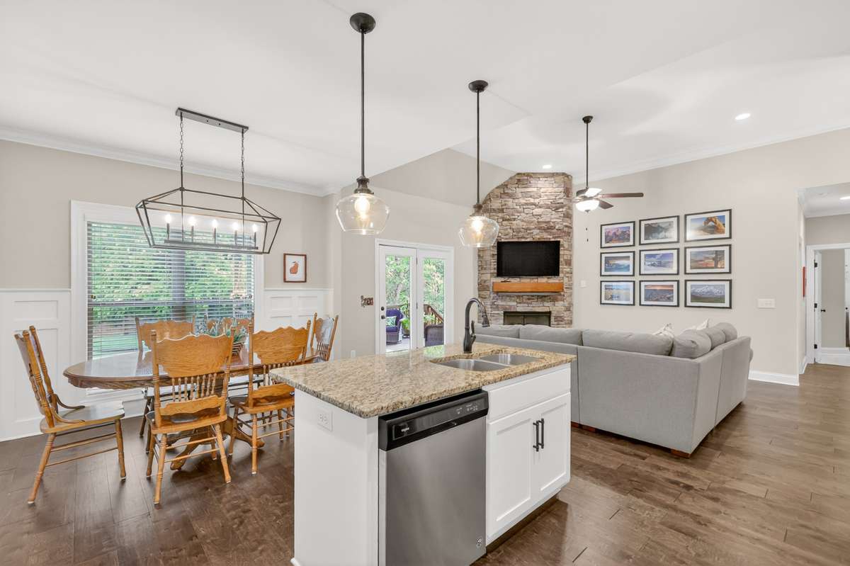 You will miss nothing going on in the family room when you're in this kitchen