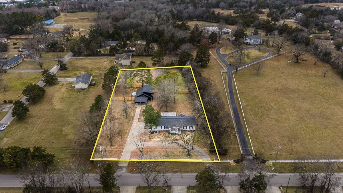 TWO INCOME PRODUCING HOMES ON NEARLY 1.5 ACRES!