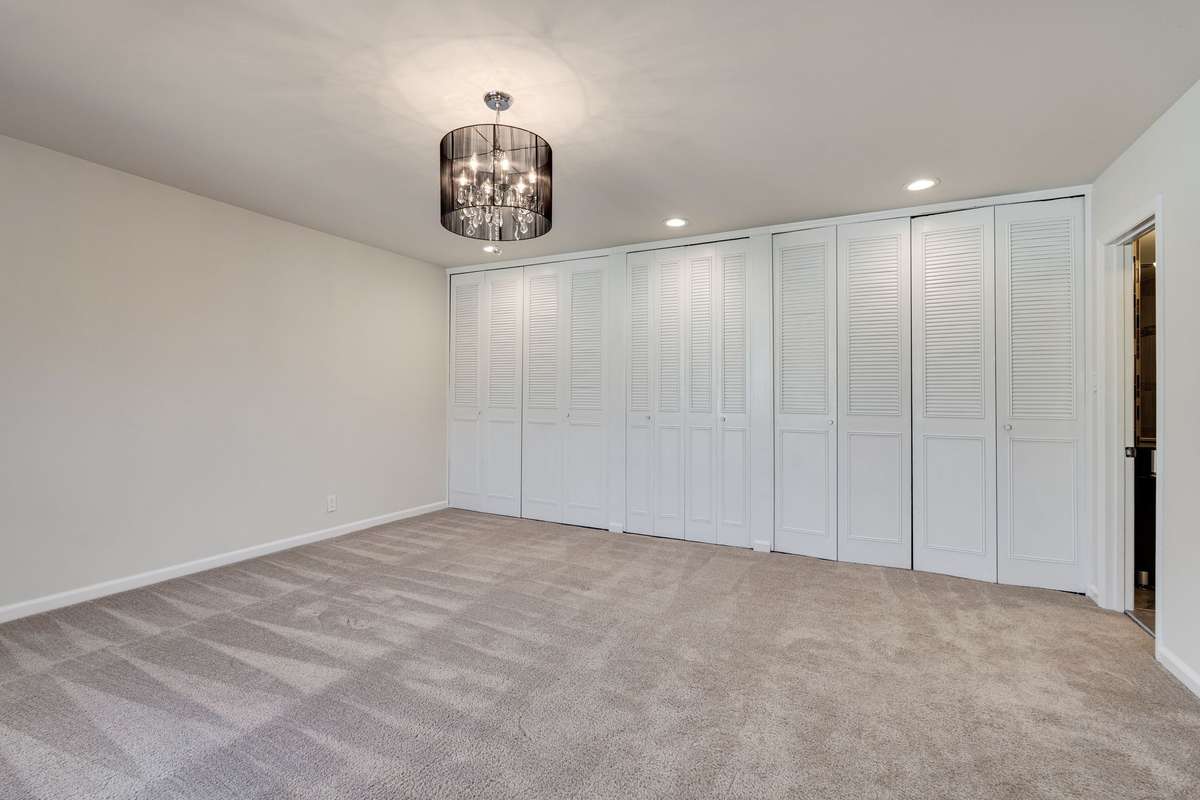 The primary bedroom has three large closets and there is a linen closet in the hall in addition to two more deep and generously sized closets for all your organization and storage needs