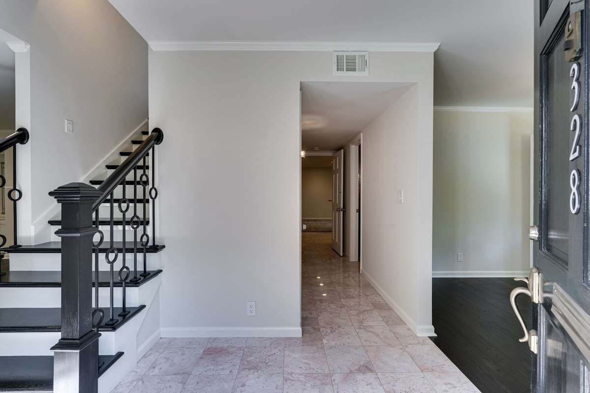 As you come in the home, you are greeted by a welcoming foyer