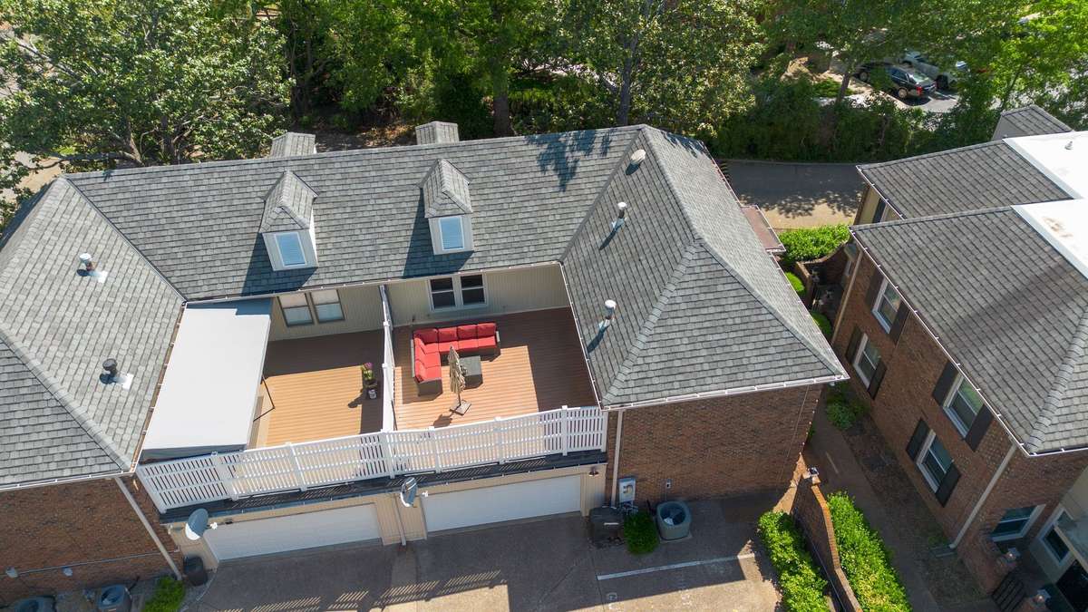 Notice the lush greenery that envelopes the townhouse