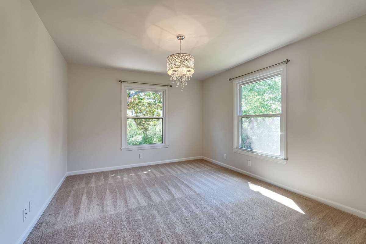 Bedroom #3 has beautiful natural light and a large walk-in closet