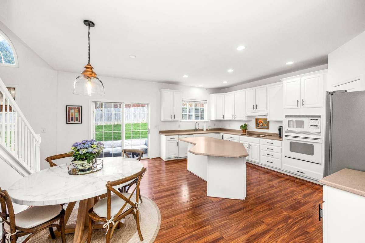 Freshly painted kitchen and cabinets.