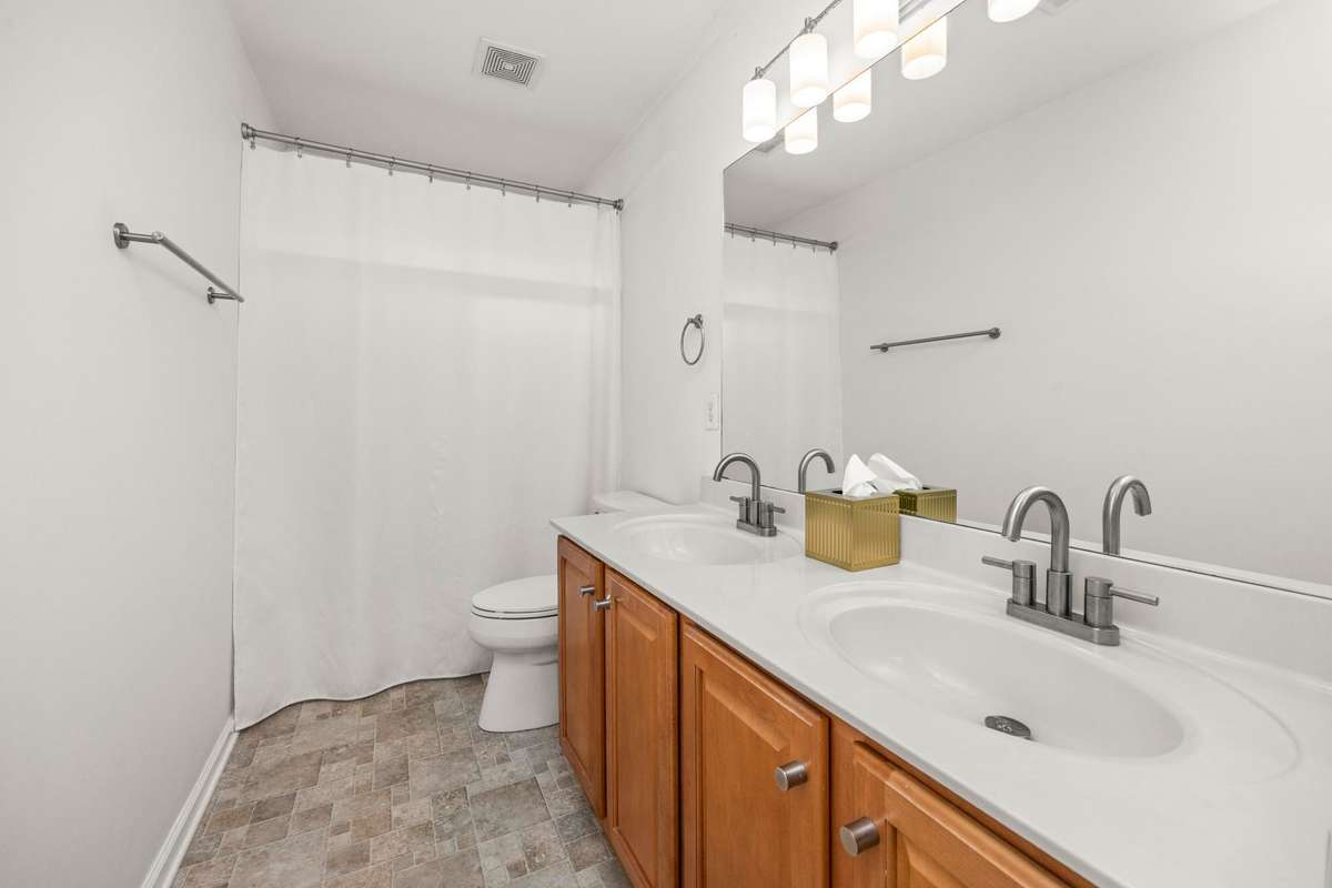 Upstairs bathroom with double vanity