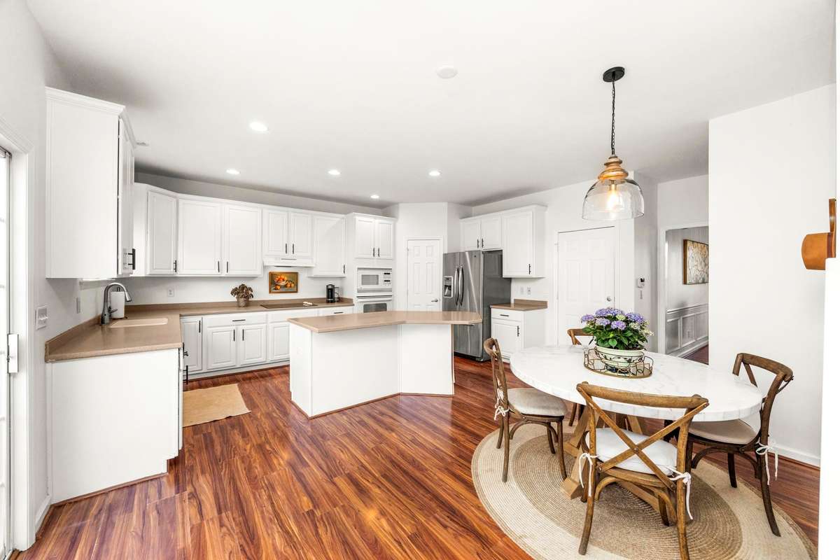 Freshly painted kitchen and cabinets.