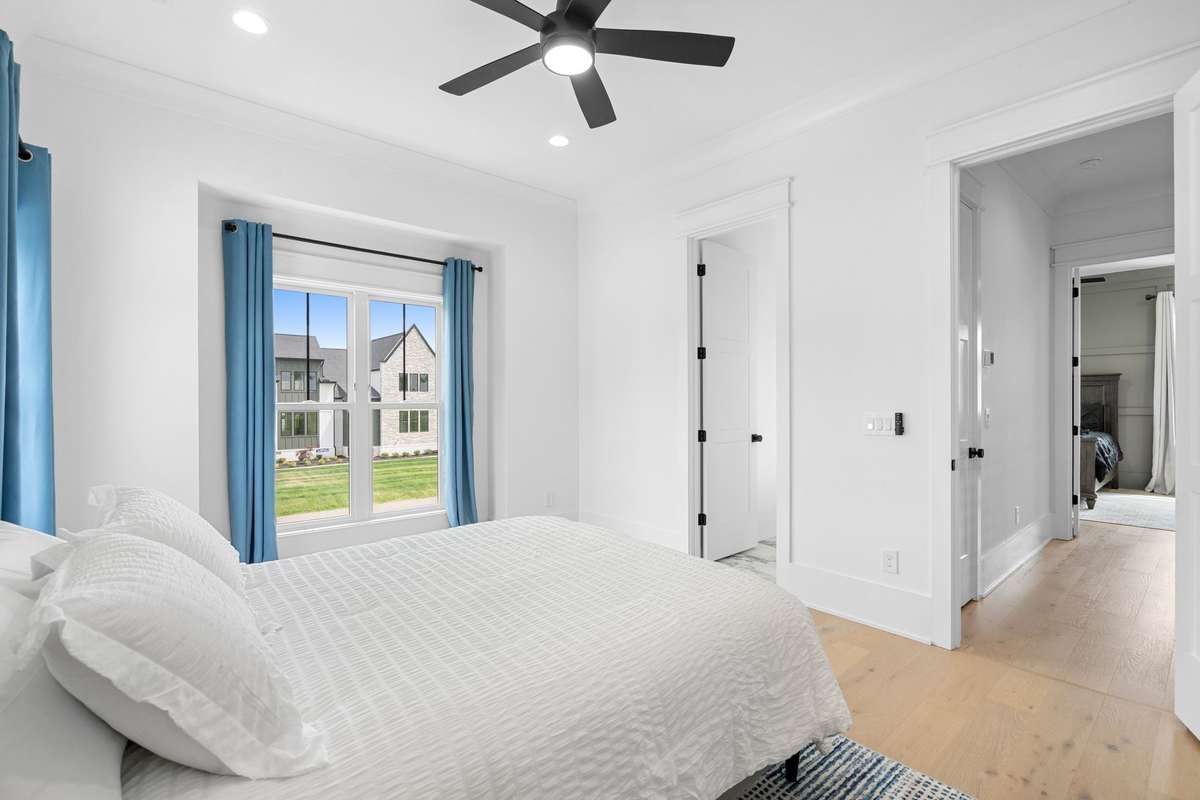 Bedroom #4 features a most generous layout with abundant natural light and easy access to the ensuite bath and living areas.