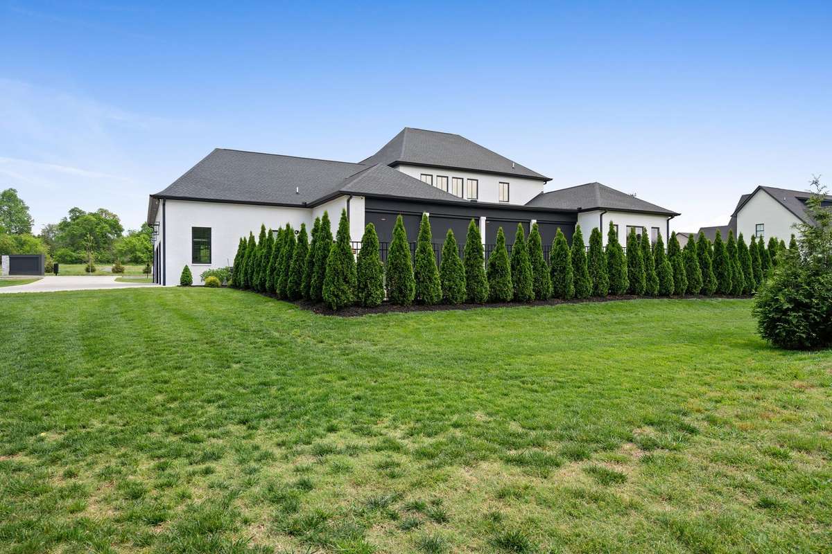 Level backyard with mature privacy landscaping and irrigation on nearly 3/4 acre.