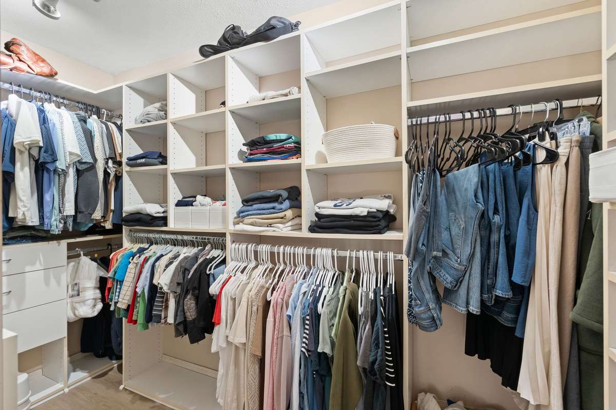 large primary closet | extra shelving