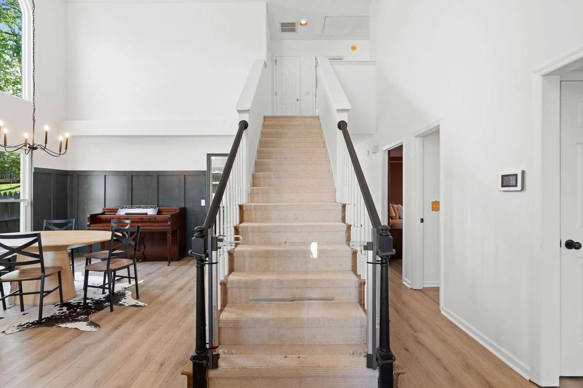 recently replaced carpet on stairs + upstairs