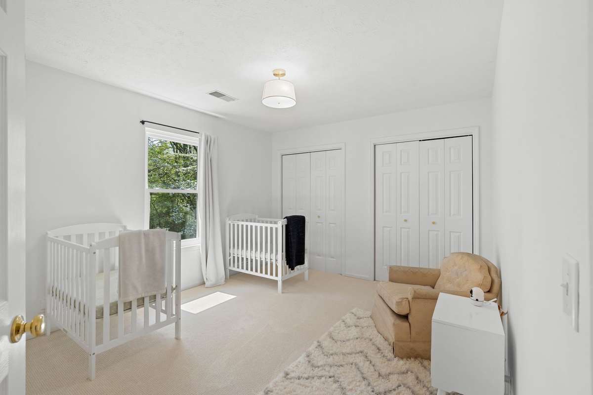 guest bedroom with extra closet space
