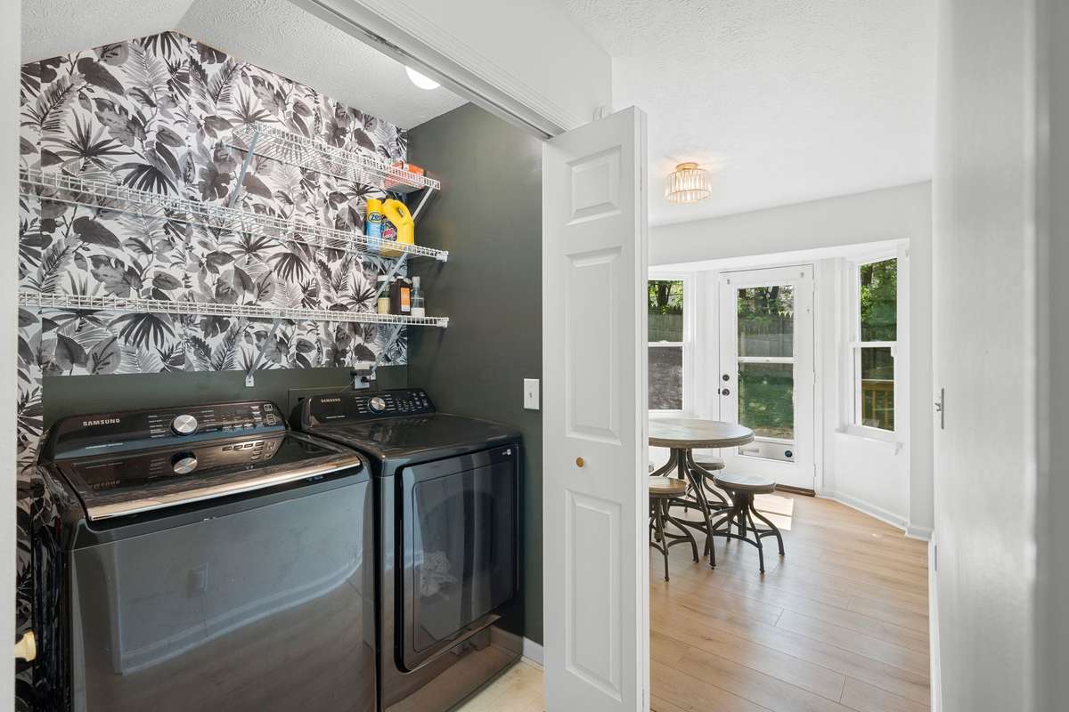 stylish laundry with extra shelves