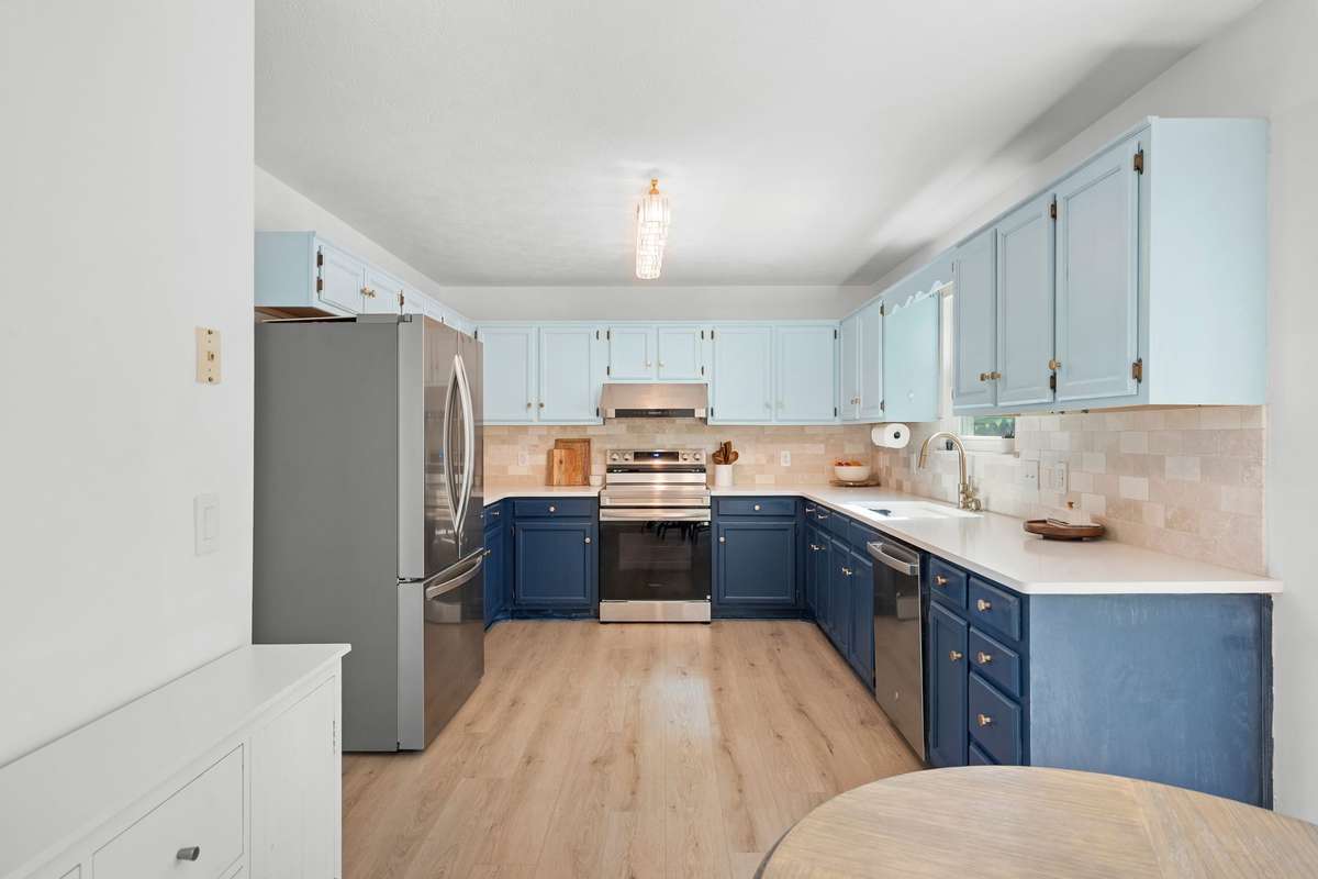 quartz countertops | LVP floors | new backsplash | stainless steel appliances