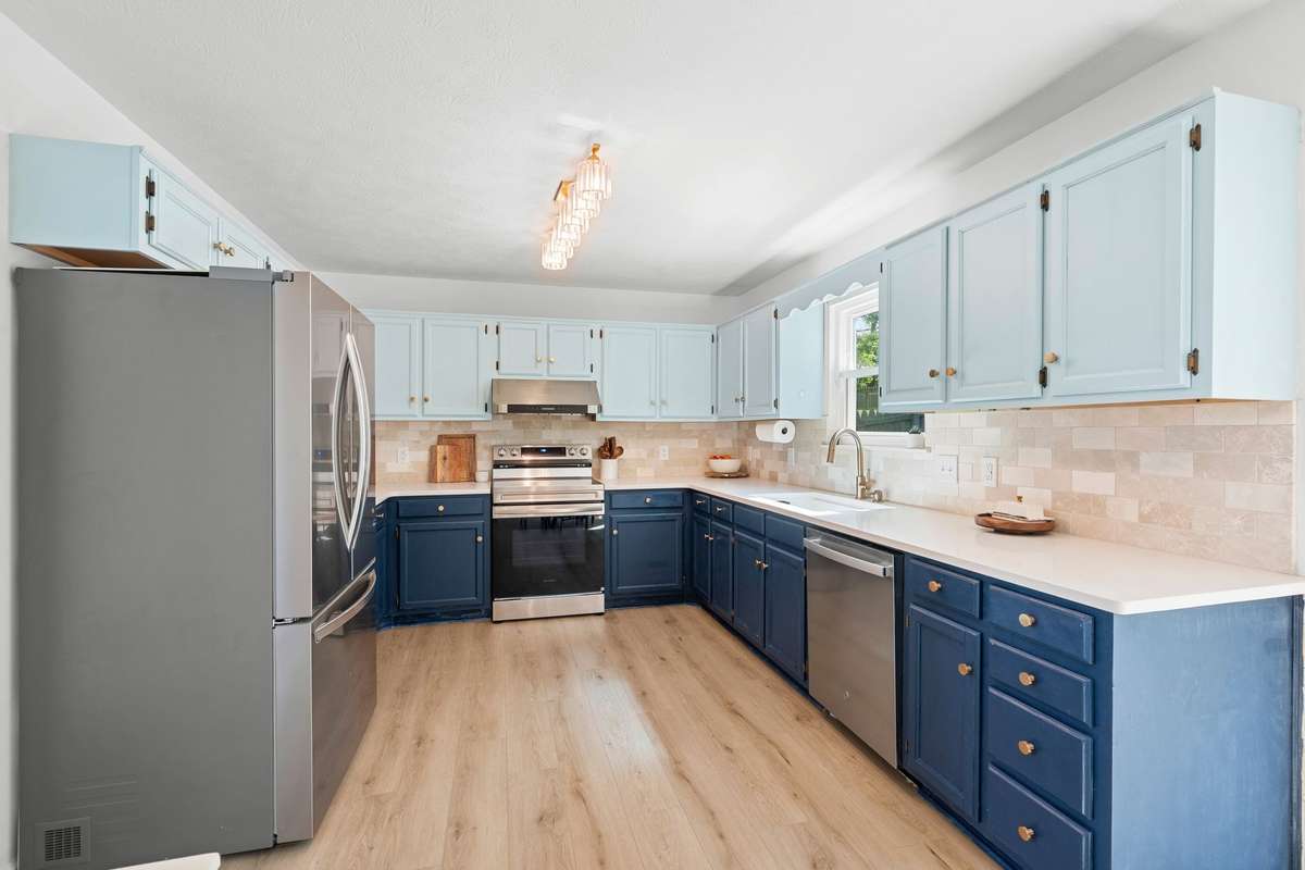 quartz countertops | LVP floors | new backsplash | stainless steel appliances