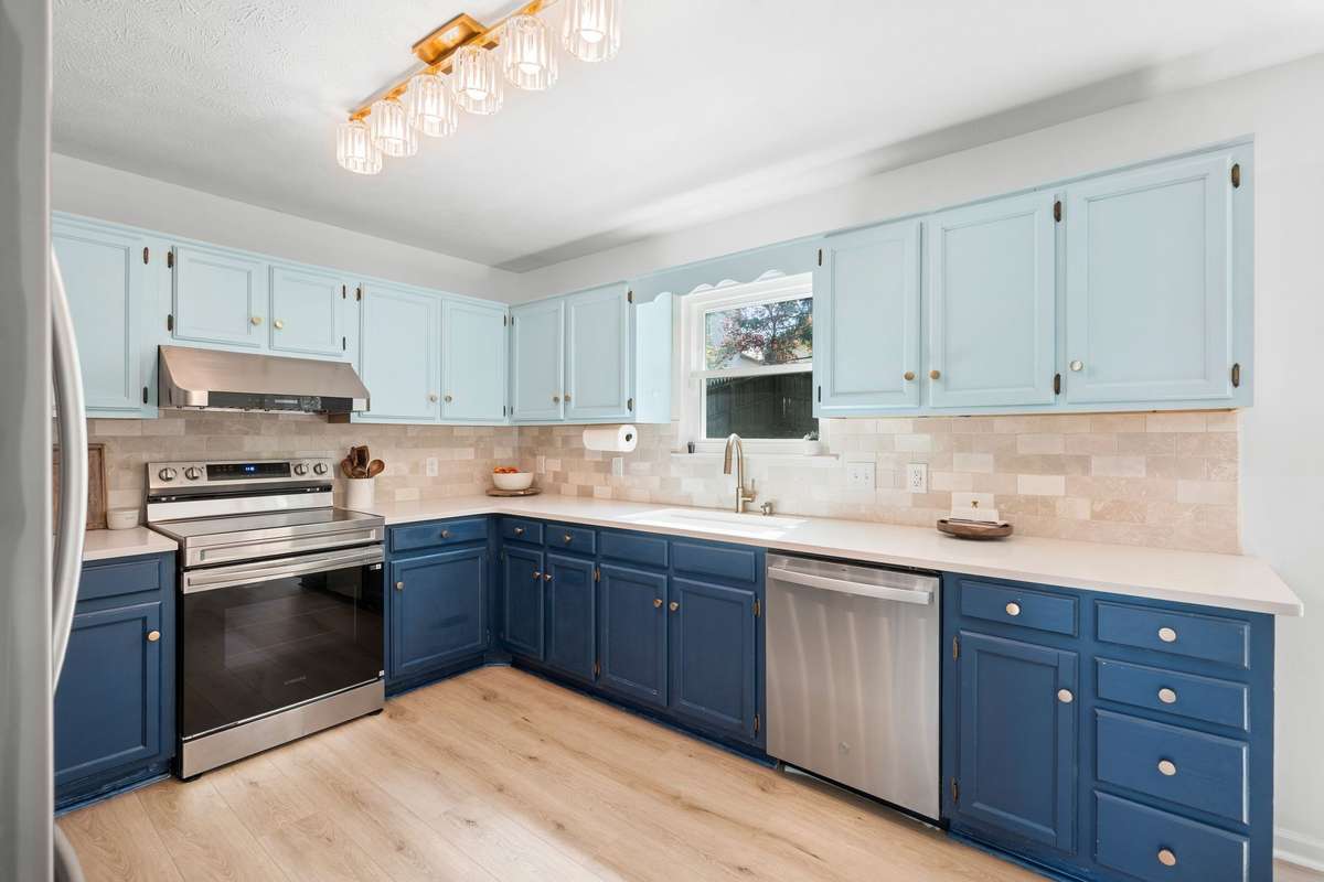 quartz countertops | LVP floors | new backsplash | stainless steel appliances