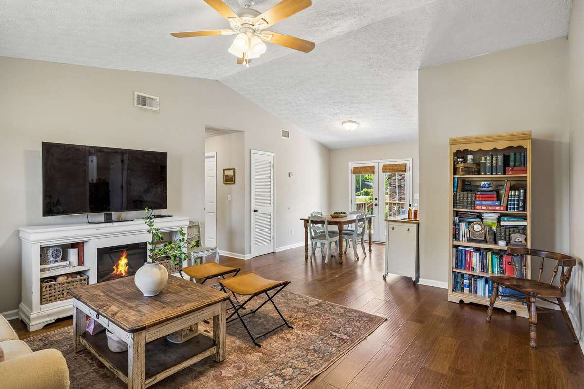 Cozy main living space leading into the dinning area and back yard.