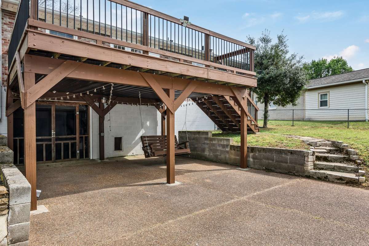 Room for 1 car in the garage and another under the deck.