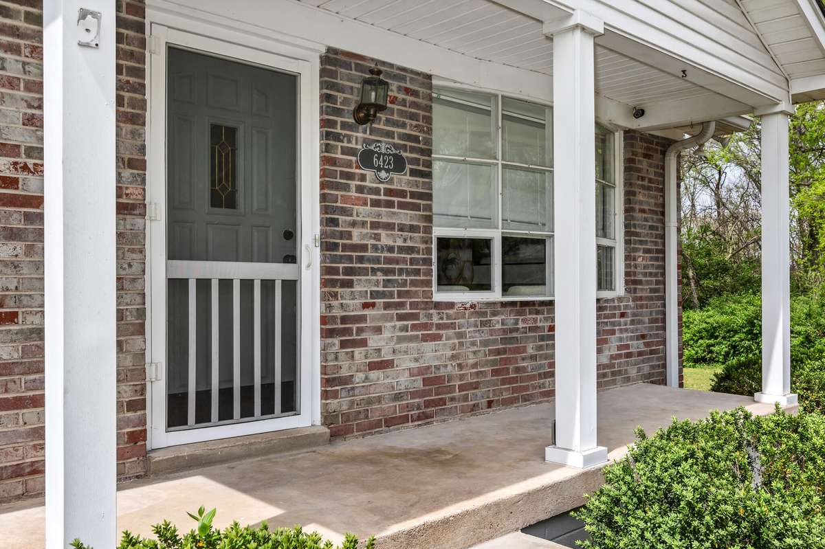 Great covered porch to enjoy morning coffee and watch Spring rains.