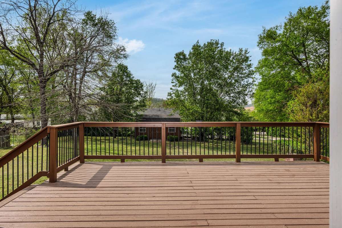 Oversized rear deck off the kitchen.