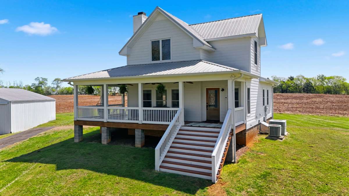 Greet your guests from your front porch as you welcome them to your cozy, country home
