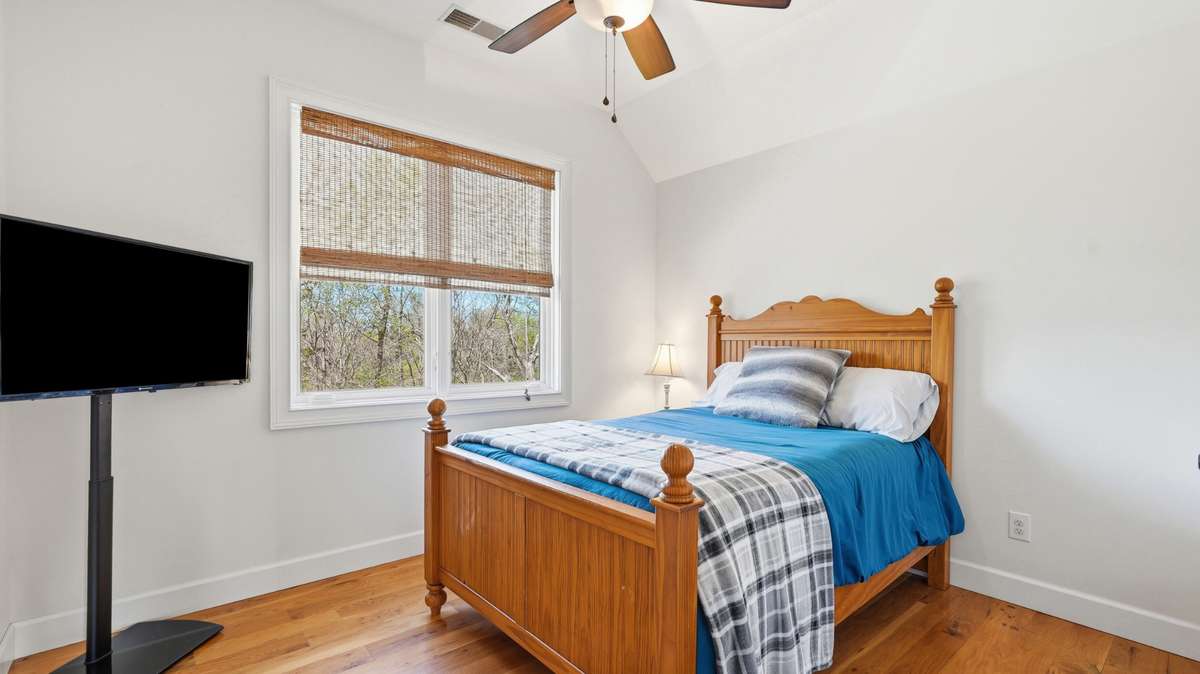 To the left is the 2nd bedroom - ample space for a queen bed.