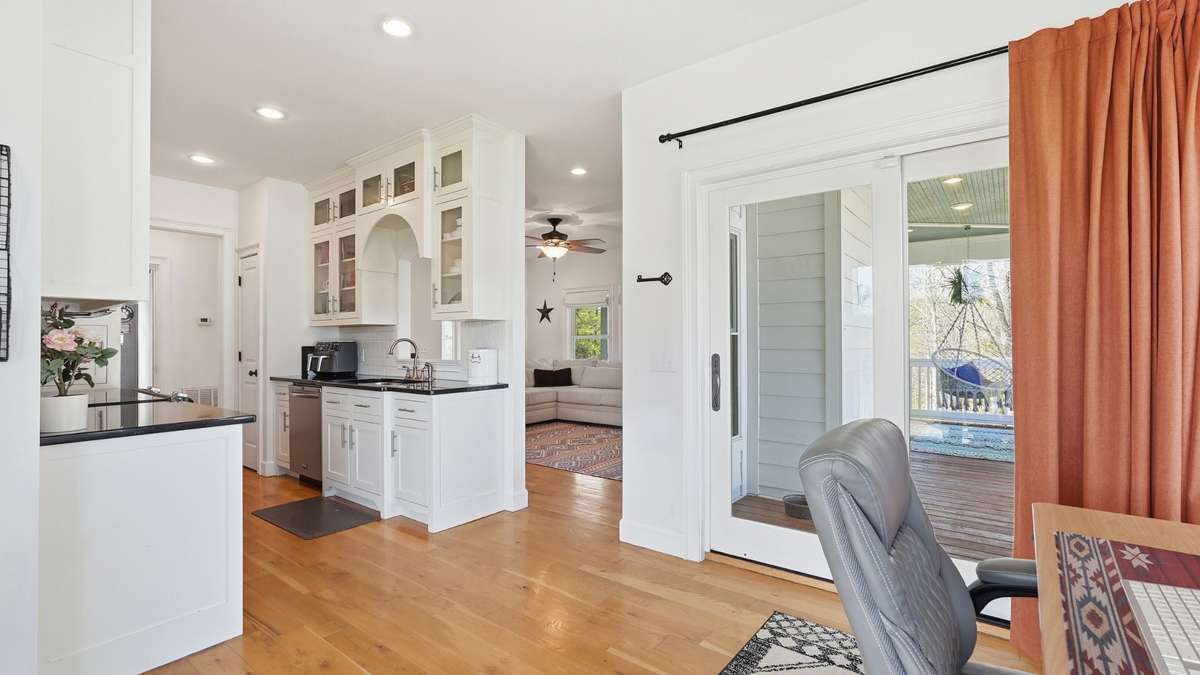 View from the dining area to the kitchen/living rooms