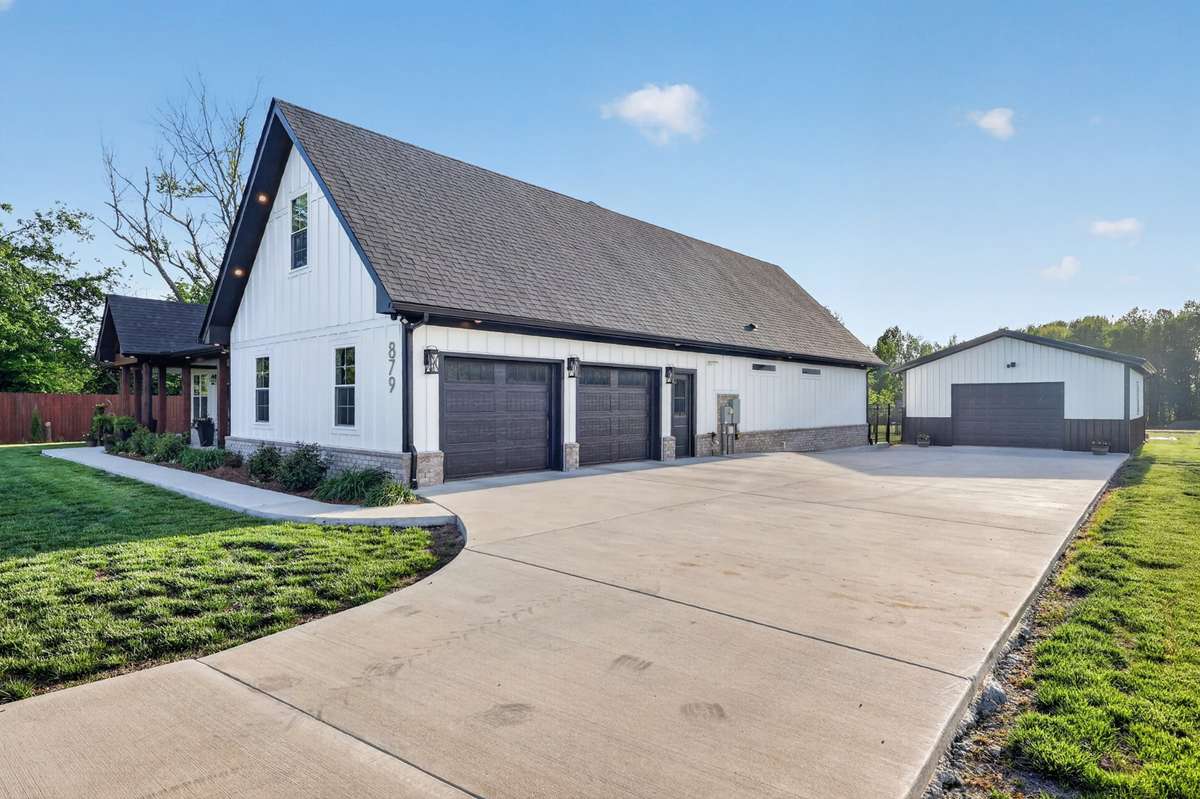 Garage space galore: oversized 27x24 attached garage has TWO 10X4 closets for additional storage! Detached 30x24 garage.