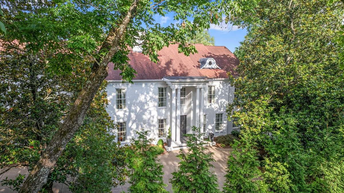 Welcome to 5028 Franklin Pike....timeless tradition nestled among mature trees...