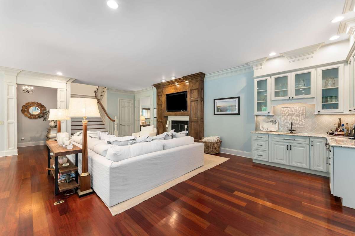 Plenty of space to cozy up to the fireplace....and right next to the wet bar for refreshments...