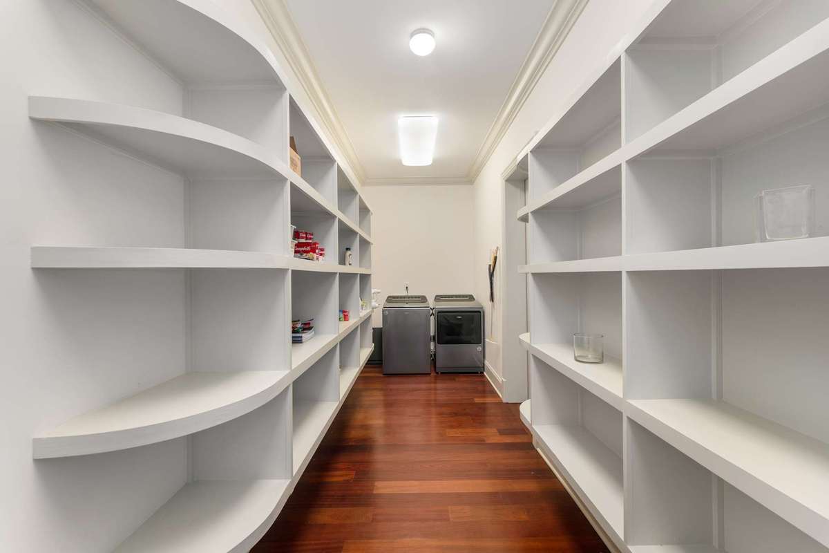 Ok, get ready for the best renovation and turn this spacious pantry right off the kitchen and easy access to the garage into the amazing Scullery it was meant to be! Hold tight...I have another placement for that washer/dryer....