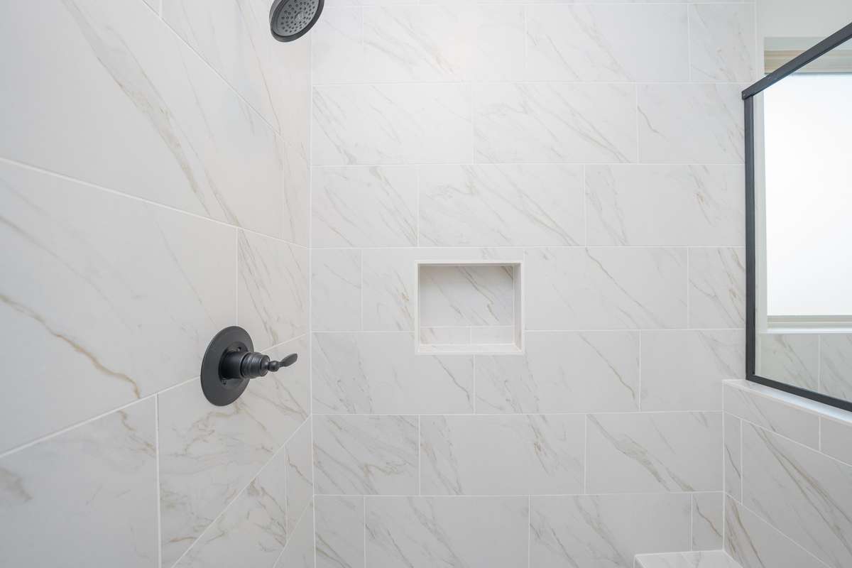 Large walk-in shower with soap niche
