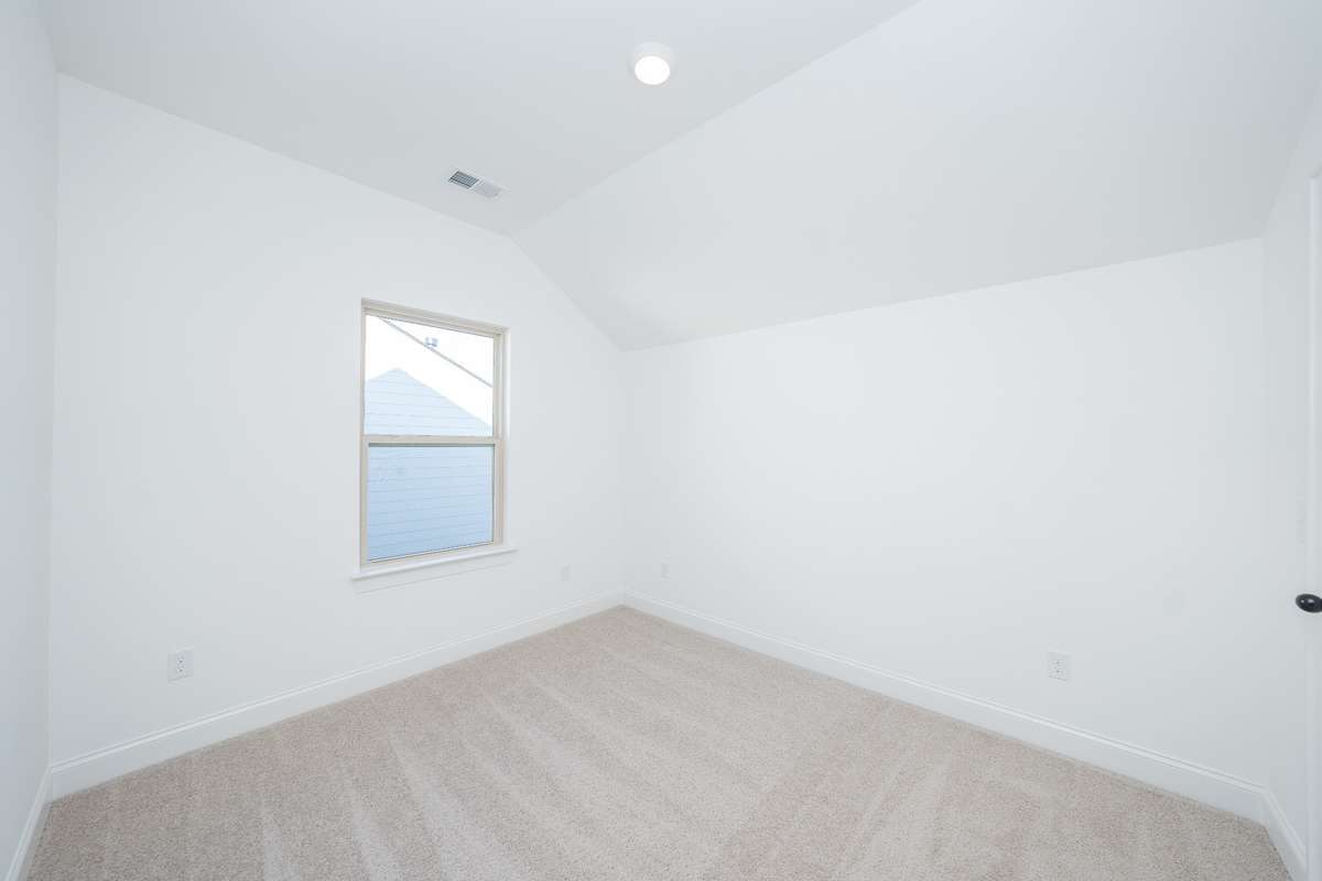 5th bedroom at top of stairs with full bath