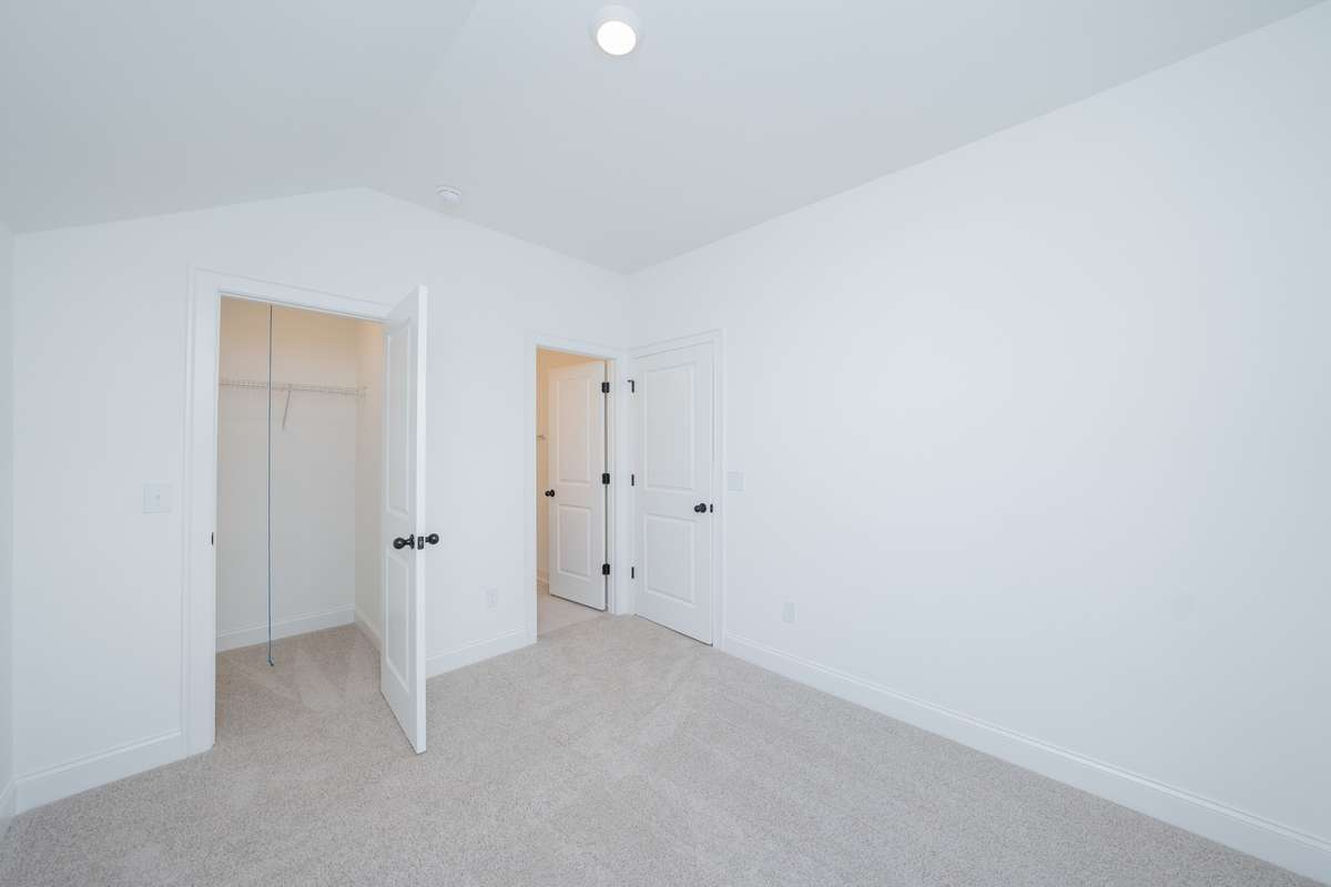 5th bdrm with walk-in closet and 4th bath
