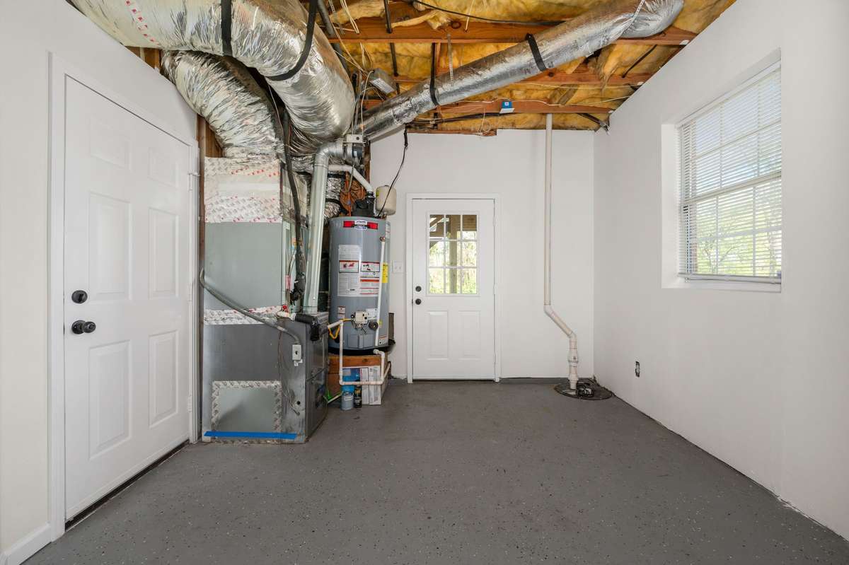 View of basement level leading out to the backyard.