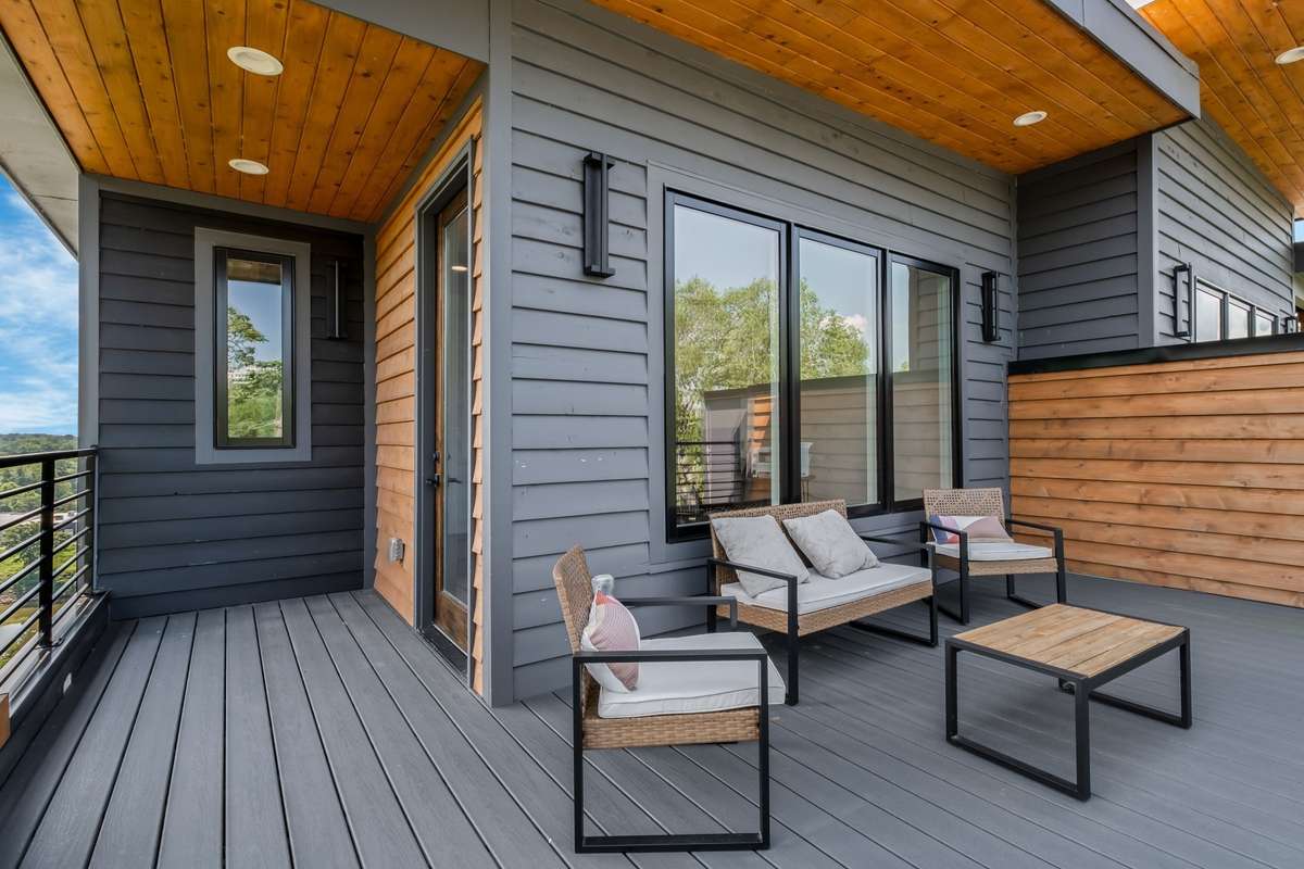 One of four private balconies - this one off the office is perfect for quiet mornings, creative inspiration, or taking calls with a skyline view.