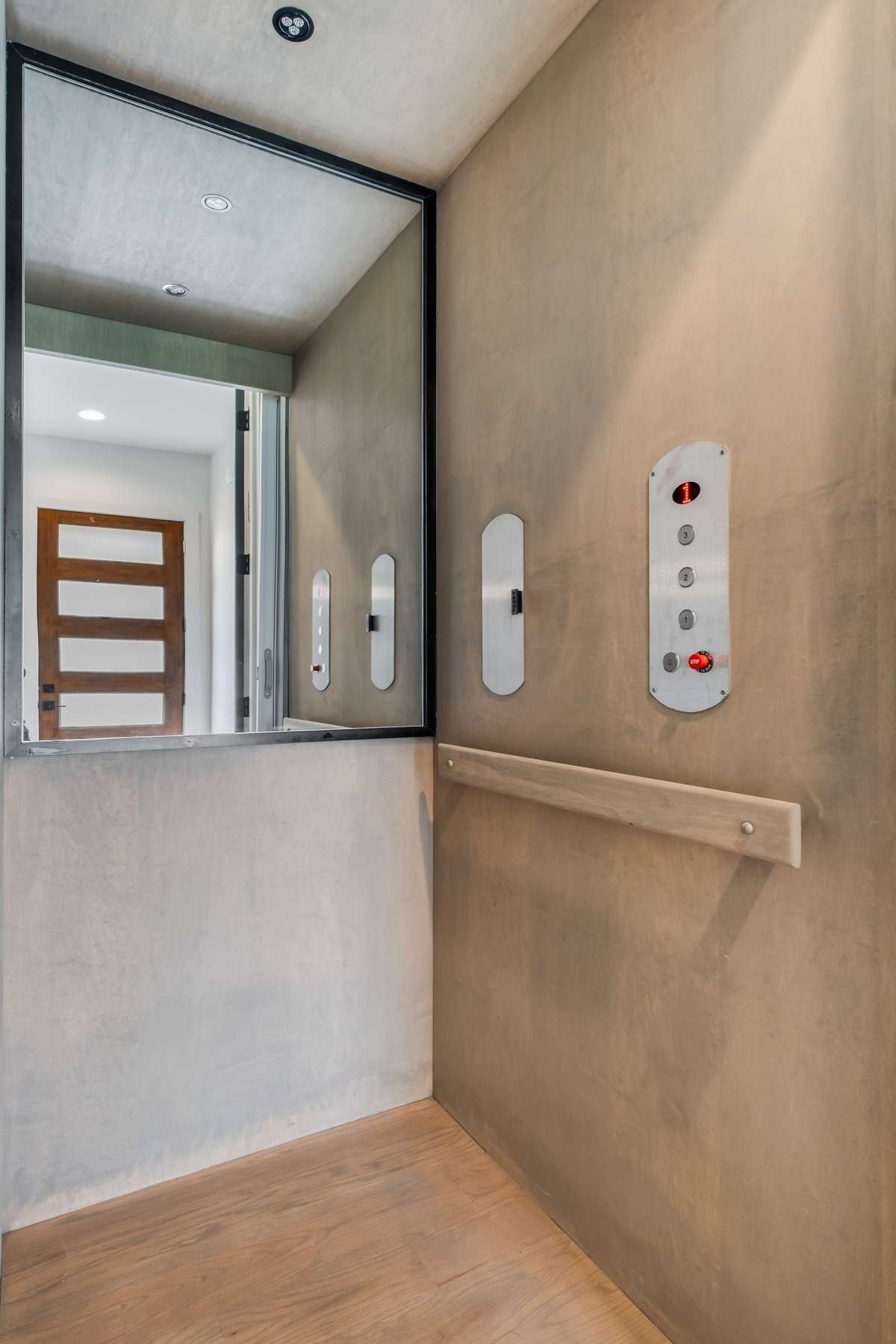 Modern and seamless, the in-home elevator brings both style and function to every floor.