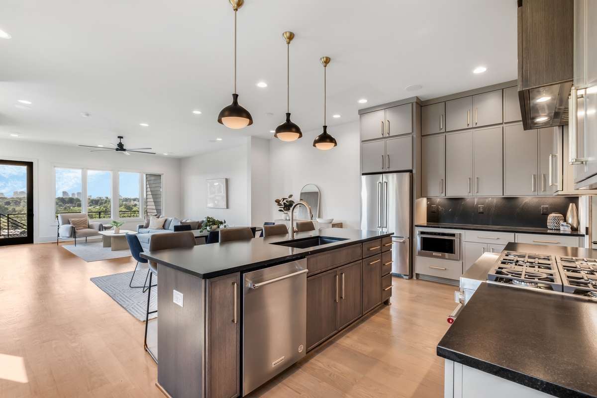 Expansive open-concept layout blends designer style with everyday comfort, perfect for both entertaining and daily living - all backdropped by skyline views.