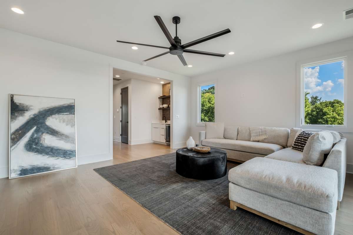 From casual hangouts to elevated hosting, the upstairs entertainment space with bar and media room offers endless possibilities for connection and relaxation.